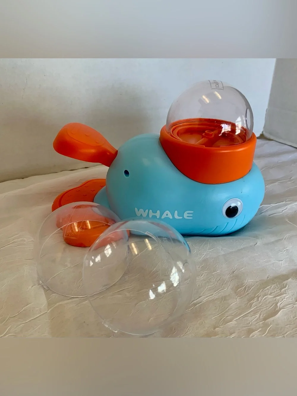 interactive whale-shaped treat dispenser and puzzle feeder for pets